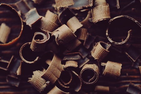Delicious dark chocolate on a brown backgroundの写真素材