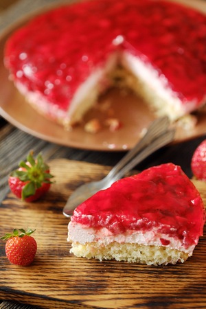 Fresh strawberry pie and berries on the tableの写真素材