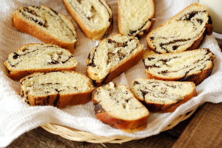 Fresh baked poppy seed roll on the table