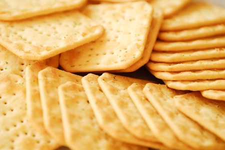 Fresh crunchy cracker with onion and saltの写真素材