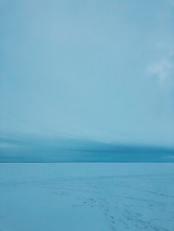 Beautiful view of the frozen river in the morningの写真素材