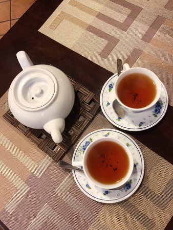 Tea with thyme in a beautiful Cup viewの写真素材