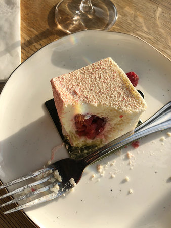 Delicious mousse cake with berries in the cafe