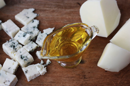 Blue mold cheese with honey on the tableの写真素材