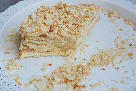Delicious Napoleon cake on a white plateの写真素材