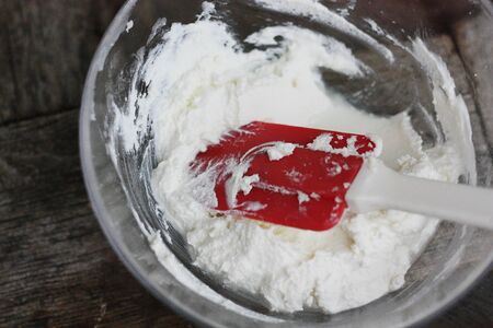 Fresh cottage cheese on a wooden tableの写真素材