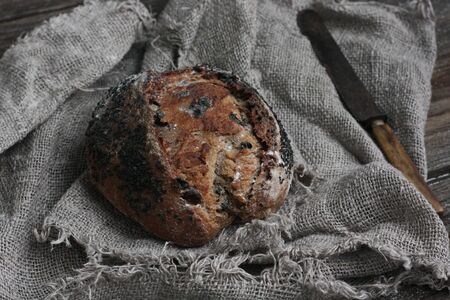 Fresh bread with black sesame and raisinsの写真素材