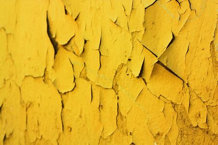 Beautiful old yellow wall close up viewの写真素材