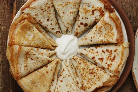 Delicious fresh crepe with sour cream macroの写真素材