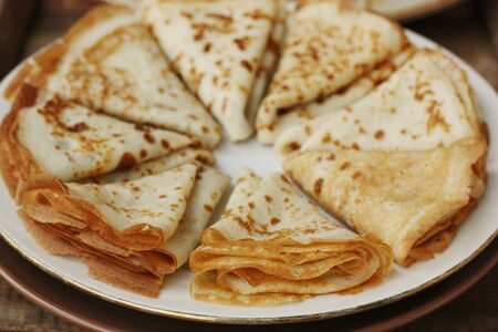 Delicious fresh crepe on the plate macroの写真素材