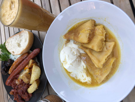Pancakes with ice cream and caramelized onion served with bread