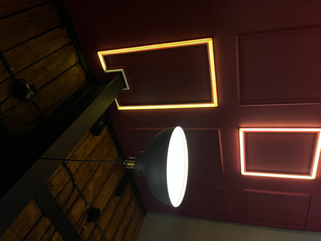 Interior of a room with a wall lamp. 3d rendering