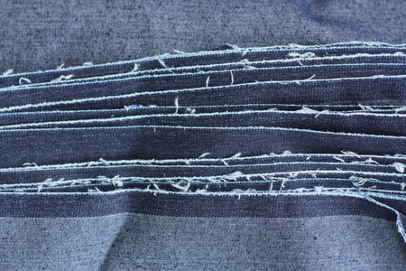 close up of blue jeans fabric texture. background and texture for design