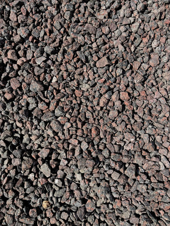 Background texture of small gravel stones, close-up, macro.