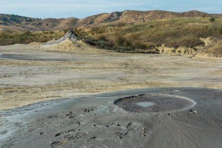 Active mud volcanoes park captured in Romaniaの写真素材