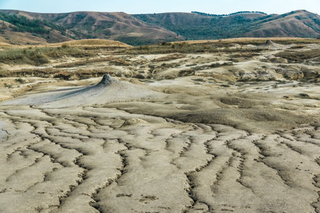 Active mud volcanoes park captured in Romaniaの写真素材
