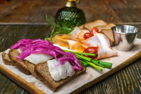 Eastern European style board with several kinds of snacksの写真素材