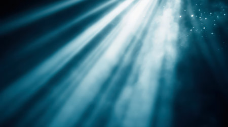 Light beams shining through a misty atmosphereの素材