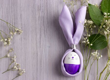 Easter Bunny on the white wooden table