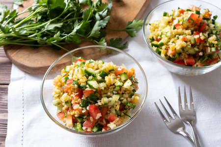 Tabouli Salad or Tabule, Tabbouleh - simple Mediterranean salad with vegetables and bulgur.の写真素材