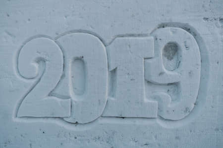 Abstract New Years and Christmas background on snowの写真素材