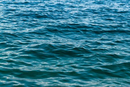 Abstract image of top view of shiny wave of clear blue sea water, for beautiful background...