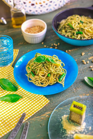 Spaghetti with homemade pesto sauce basil pine nutsの写真素材