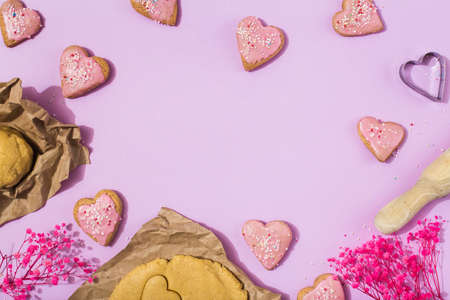 Tasty heart shaped cookies on pink backgroundの写真素材