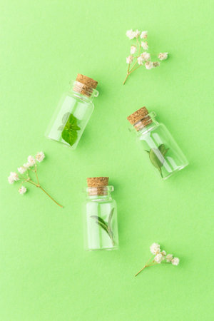 Organic, bio cosmetics healthy concept with natural plants in bottles.