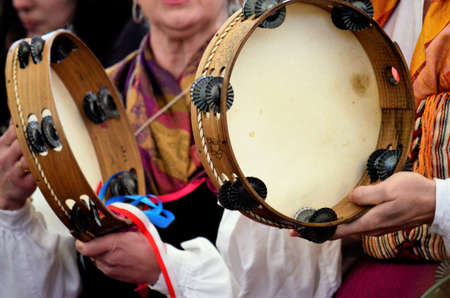 Wooden tambourines and colorsの写真素材