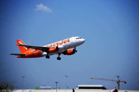 Faro, Portugal, August 11, 2016: easyJet Airbus taking off from the airport.のeditorial素材