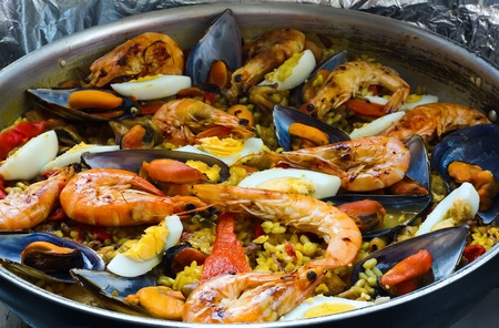typical Spanish paella in the panの写真素材