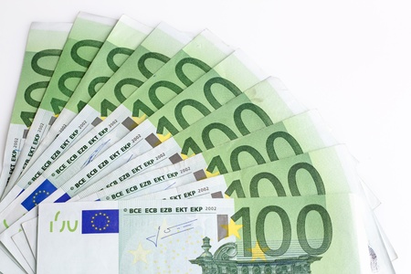 10 banknotes 100 euros isolated on white backgroundの写真素材