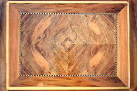 close up of a luxury wooden table, with arabesque motifs   wooden textured table 