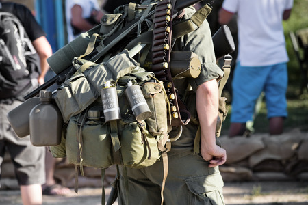 soldier carrying a backpack with combat equipment  ww2 reenactmentの写真素材