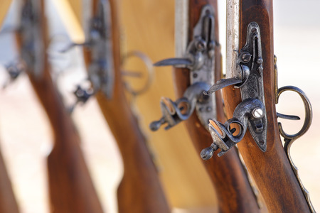 Civil War muskets aligned in a gunsmithの写真素材