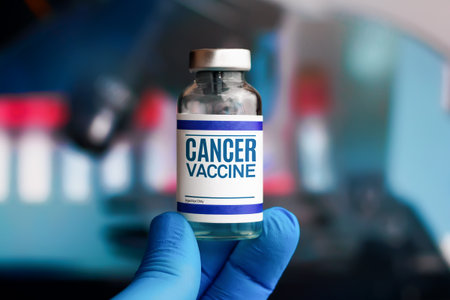 Experimental cancer vaccine vial for immunization against Cancer disease. Doctor with vial of the Cancer vaccineの写真素材