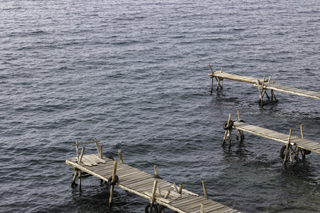 Three wooden docks in the Titicaca lakeの写真素材