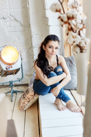 Sexy Nude brunette in bedroom in lingerie, perfect figure and body of woman, morning of erotic girl. Naked woman on bed, nice body and long black hairの写真素材