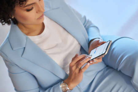 Afro curly hair fashion woman, natural makeup and cosmetics. Beauty face smile portrait of a woman with black curly hair, afro hairstyle. Curlsの写真素材