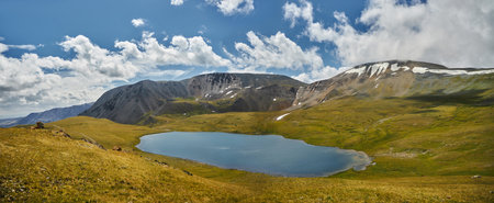Panorama Mountain valley of Altai mountains, fabulous Alpine landscape of the peaks of the ridges, amazing views of the valley in summer. Hikeの写真素材
