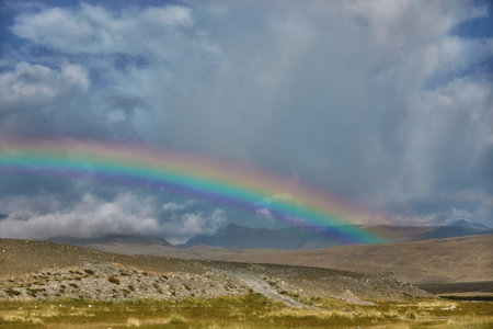 Amazing alpine landscape mountains of Mongolia, panorama of the mountain valley river, amazing views of the valley in summer. Hiking, wildlife, ice peakの写真素材