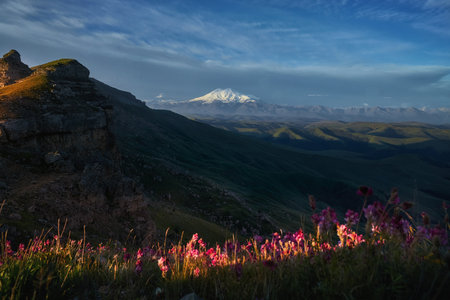 Morning landscape on peaks of Mount Elbrus. Big high mountain covered with snow, Caucasus Mountains,...
