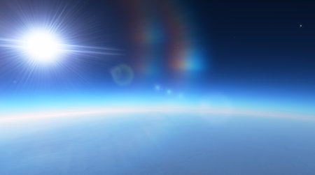 Bright sun with lens flare over Earth atmosphere, space background with stars. 3d renderの写真素材