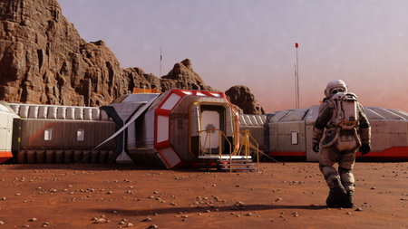 Astronaut strides towards modular space habitat on Mars, against a backdrop of towering rock...