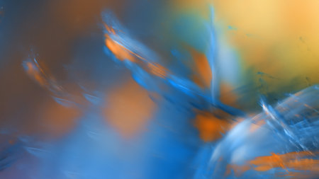 Vibrant shades of blue and orange blend together in an abstract design, creating a sense of movement and energy. soft textures invite viewers to immerse themselves in the colors. 3d render.の写真素材