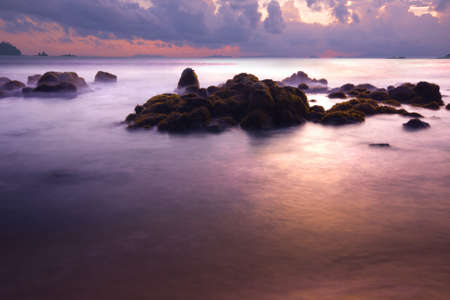 Red sunset at payam beach, koh payam thailandの写真素材