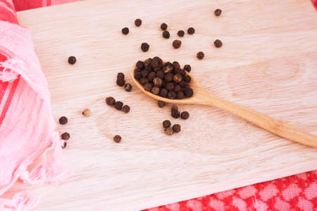 Spices and chopping wood on the apron.