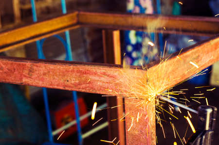 welding steel with sparks lightingの写真素材