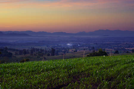 Sunset with silhouetted mountains at Moonの写真素材